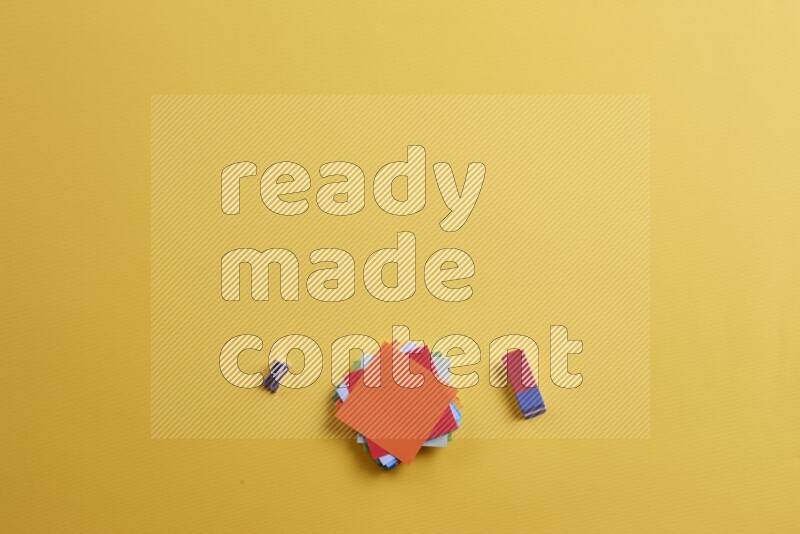 Multicolored sticky notes with school supplies on yellow background