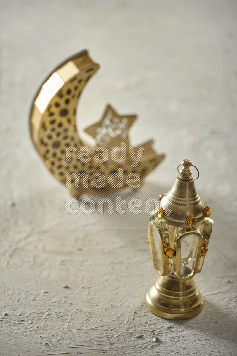 A crescent lantern with classic lantern on textured white background