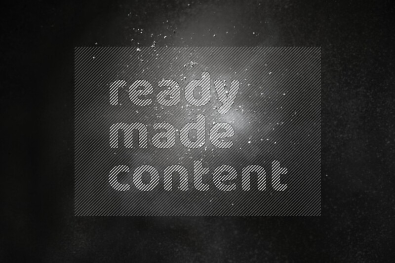White powder explosion on black background