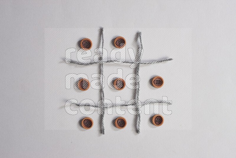 Wooden buttons placed on grey background