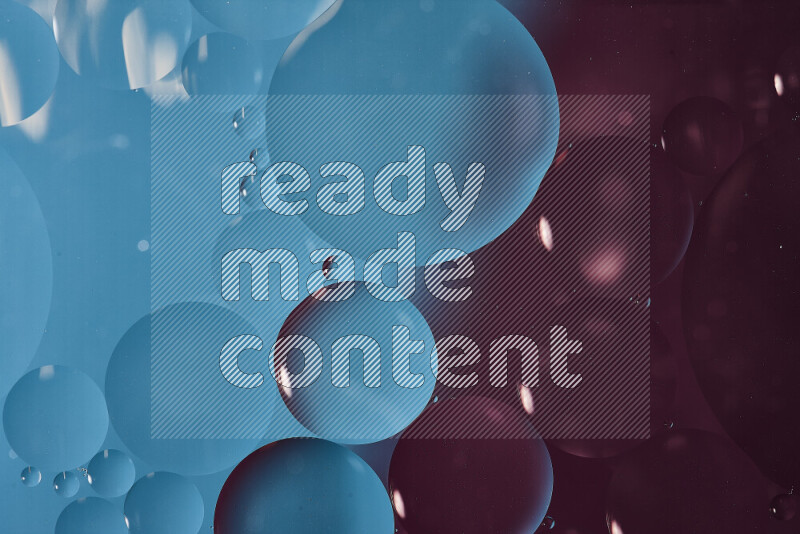 Close-ups of abstract oil bubbles on water surface in shades of blue and purple