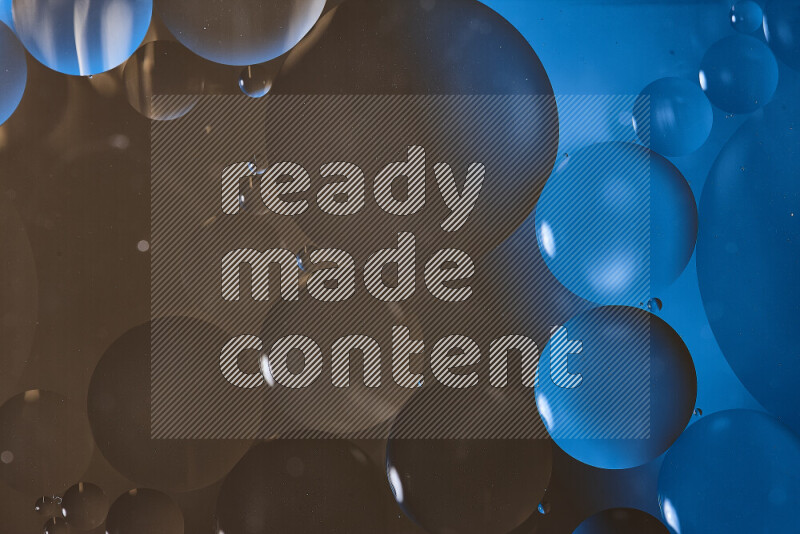 Close-ups of abstract oil bubbles on water surface in shades of blue and brown