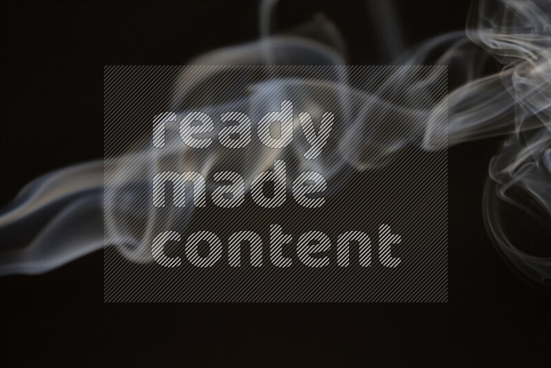 Motion of wavy smoke isolated on dark background