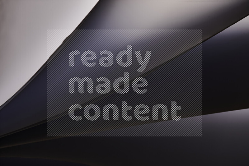 فن تجريدي يعرض منحنيات مع تدرجات الألوان الباردة مكونه بضوء ملون