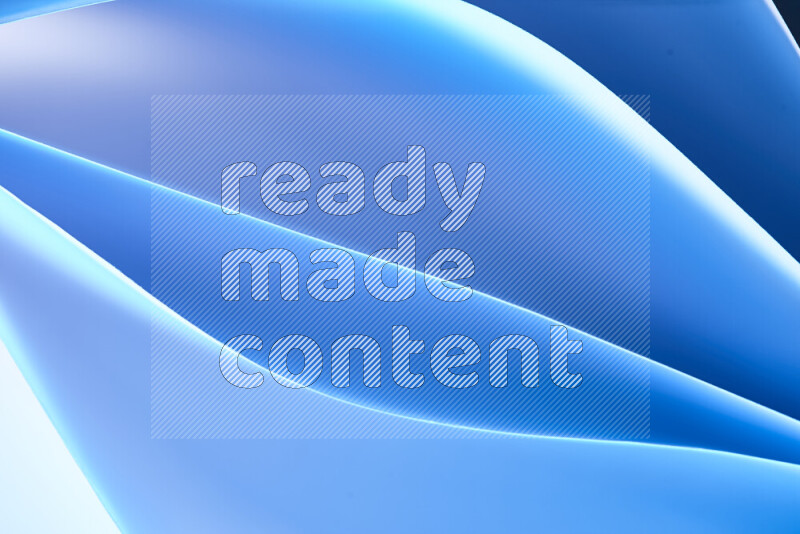 This image showcases an abstract paper art composition with paper curves in blue gradients created by colored light