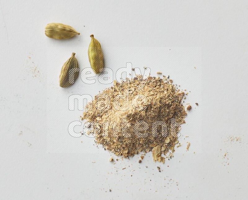 Top-view shot of Cardamon on white background