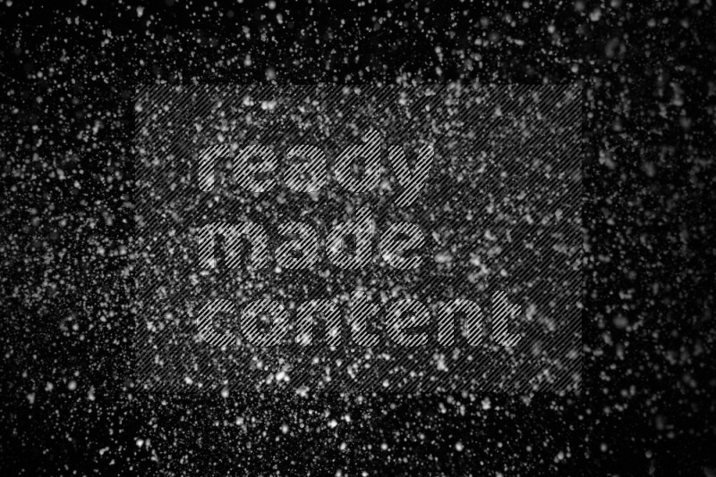 Snow spray on black background