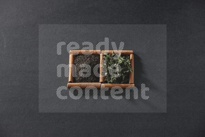 2 squares of cinnamon sticks full of tea and dried mint leaves on black flooring
