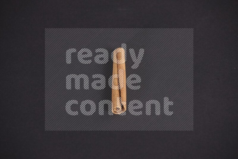 Cinnamon stick on black background