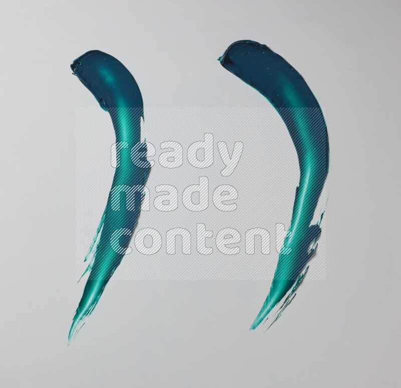 Turquoise curved painting knife strokes on white background