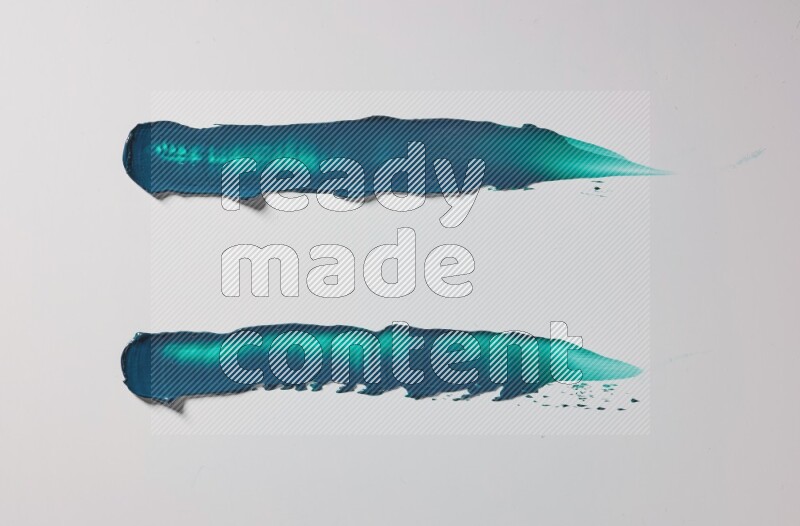Turquoise painting knife strokes on white background