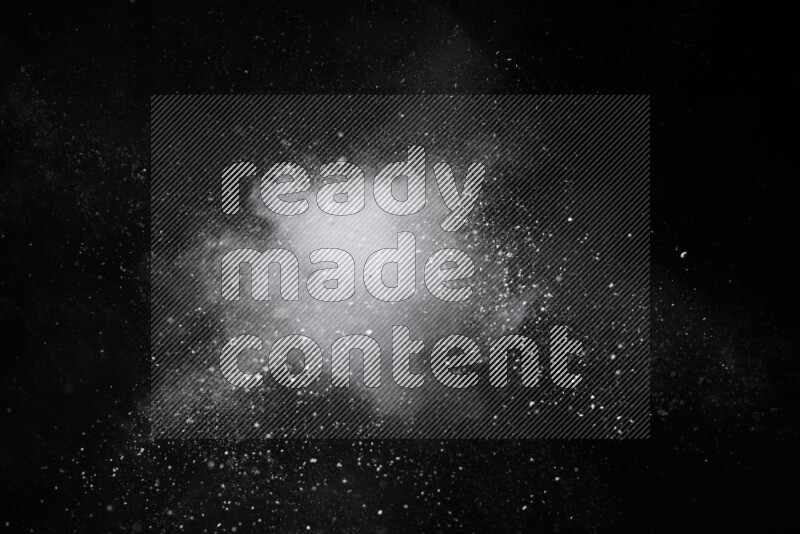 White powder explosion on black background