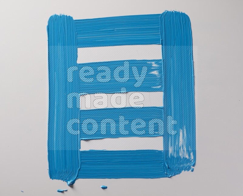 Multi blue straight brush strokes in different shapes on a white background
