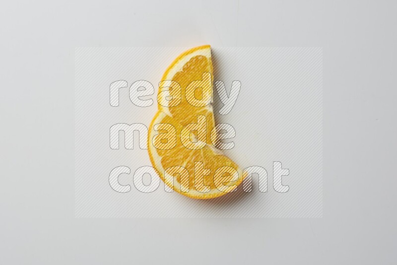 Two halves of an orange slices on white background