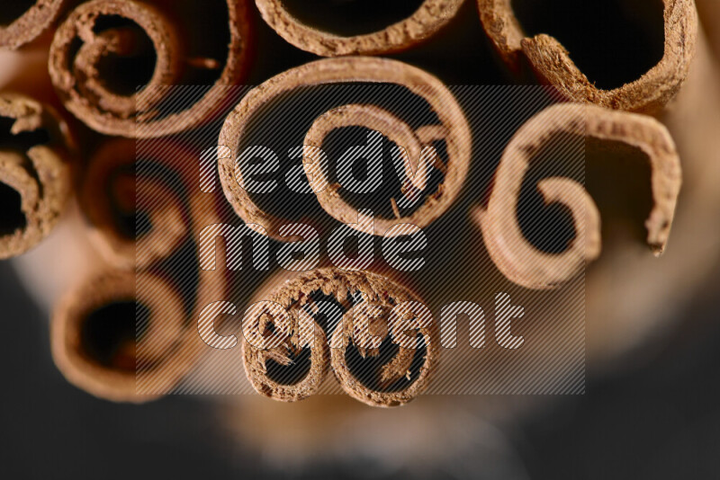 Cinnamon sticks on black background