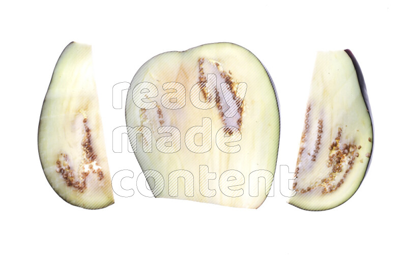 Eggplant slices on illuminated white background
