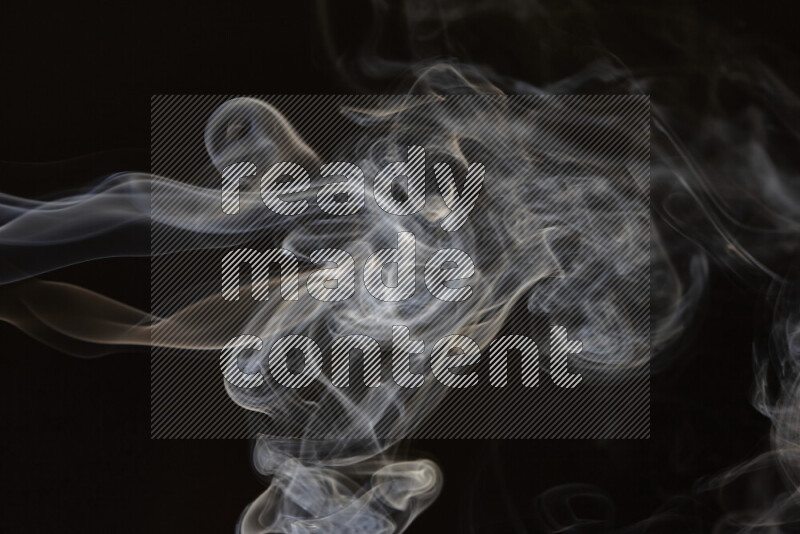 Motion of wavy smoke isolated on dark background