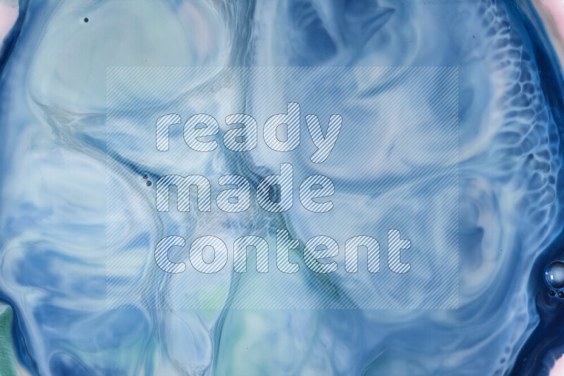 A close-up of abstract swirling patterns in blue and white