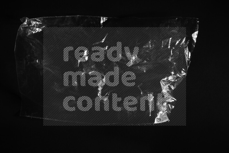 Transparent plastic textures on black background
