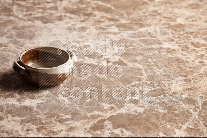 Multicolored Pottery Bowl on Beige Marble Flooring