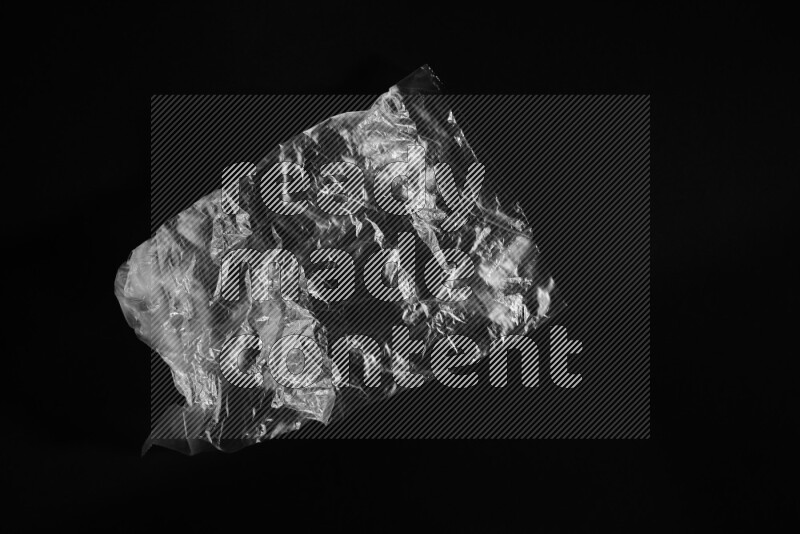 Transparent plastic textures on black background