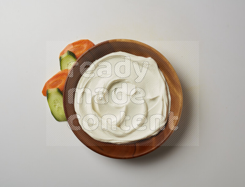 Plain Lebnah in a wooden plate on a white background