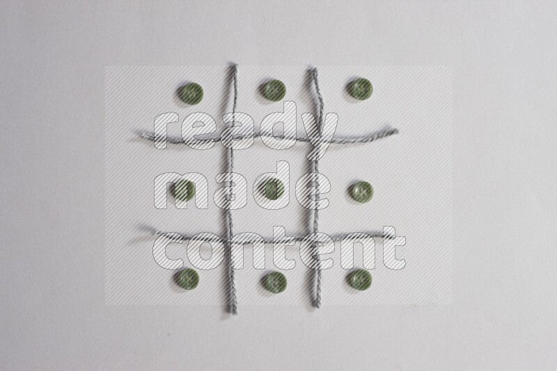 Green buttons placed on grey background