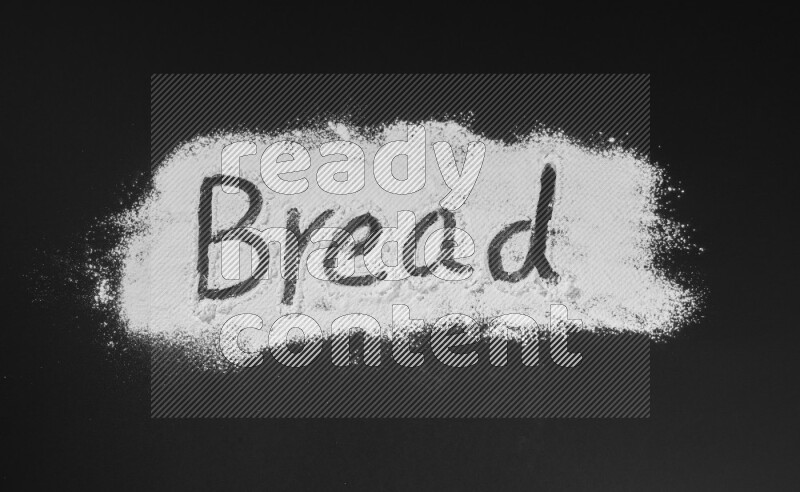 A word written with powder on black background