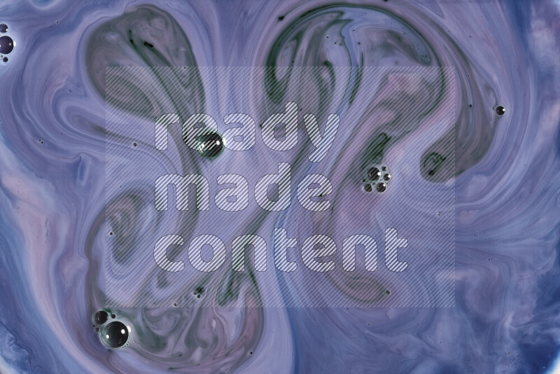 A close-up of abstract swirling patterns in blue, pink and green