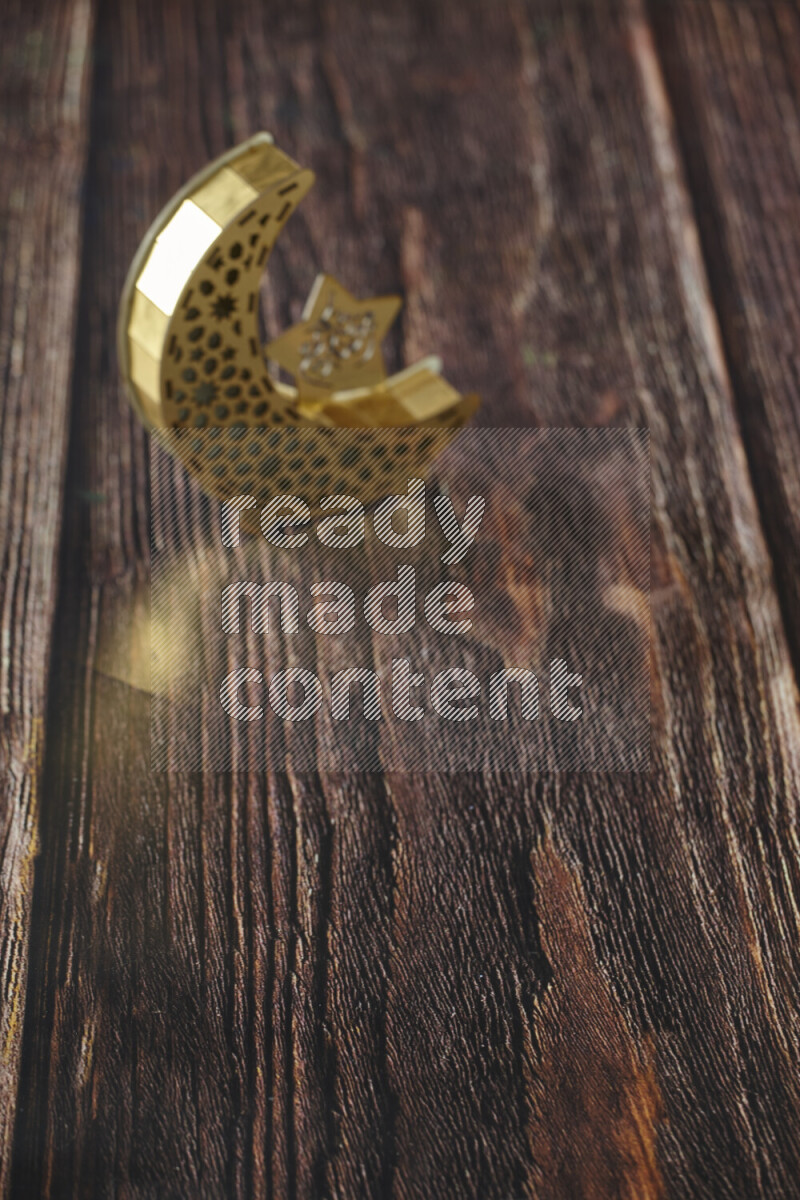 A lantern placed on a wooden background