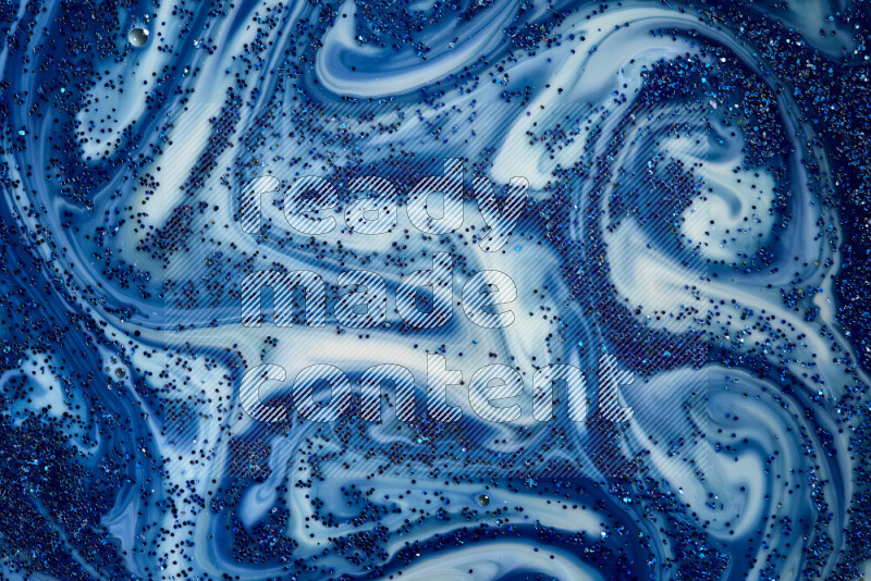 لقطة مقربة لبريق أزرق متلألئ منتشر على خلفية من اللون الأزرق والأبيض في حركات دائرية