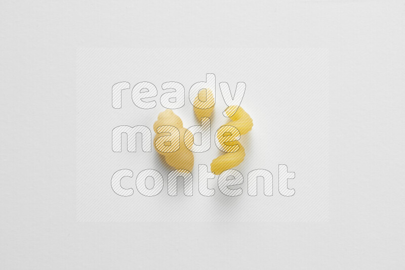 Different pasta types on white background