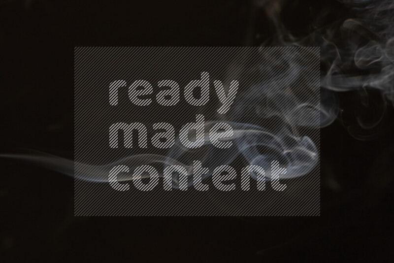Motion of wavy smoke isolated on dark background