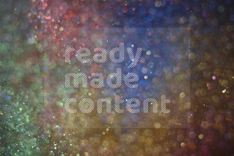 Multicolored glitter powder isolated on black background