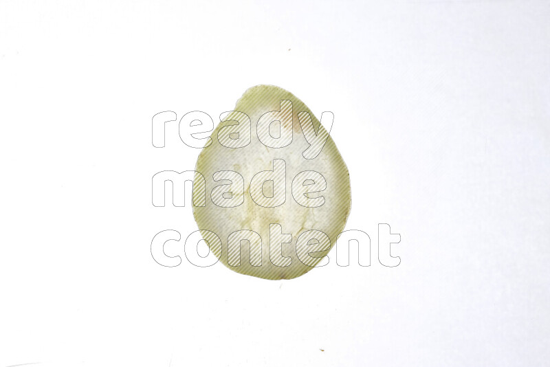 Pear slices on illuminated white background