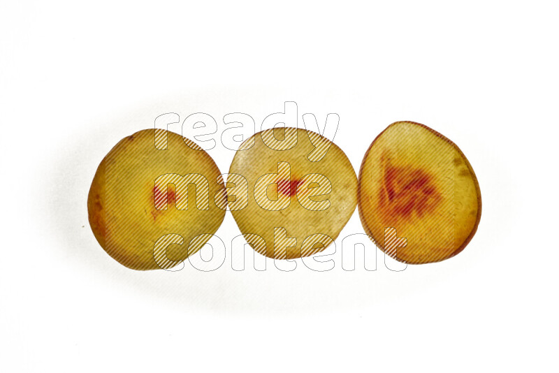 Peach slices on illuminated white background