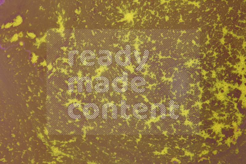 The image depicts a marbling effect with swirling patterns of purple and yellow