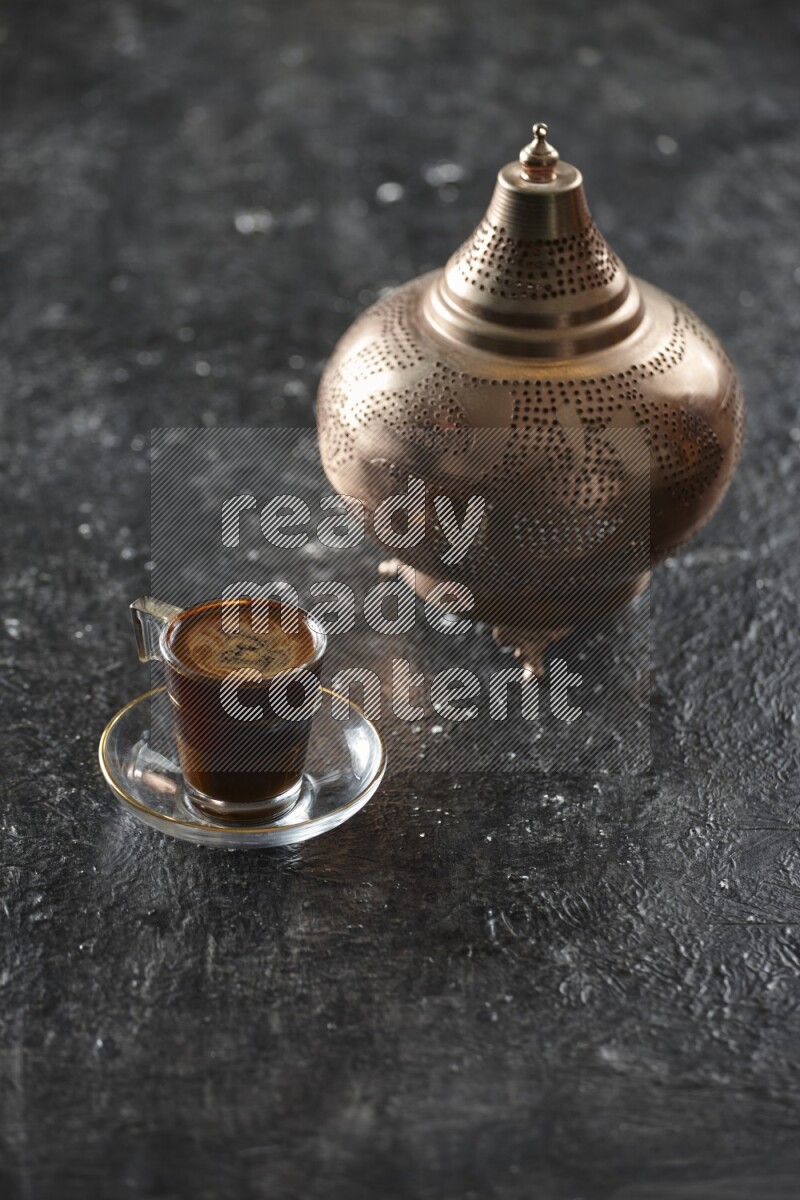 A golden lantern with different drinks, dates, nuts, prayer beads and quran on textured black background