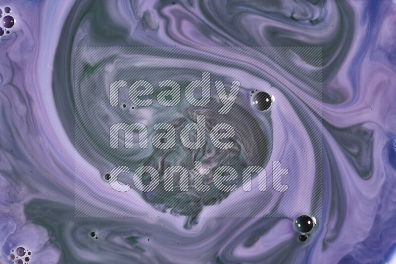 A close-up of abstract swirling patterns in blue, pink and green