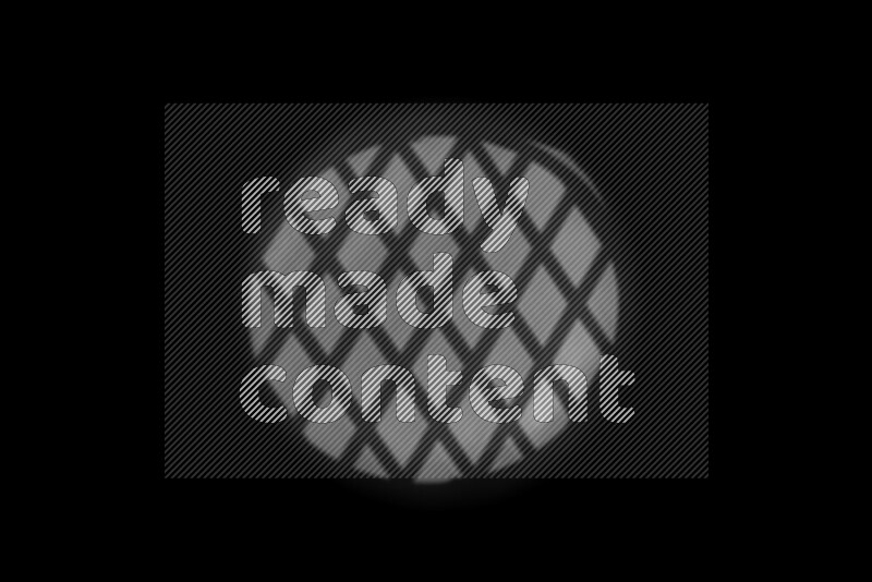 مجموعة من ضوء الغوبو الخافت تظهر أنماط هندسية علي سطح ناعم