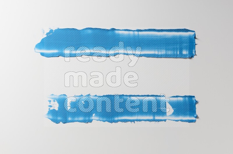 Blue painting knife strokes on white background