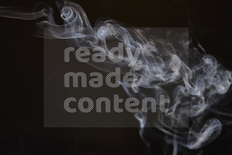 Motion of wavy smoke isolated on dark background