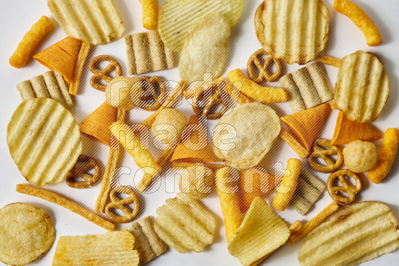 Assorted snacks on white background