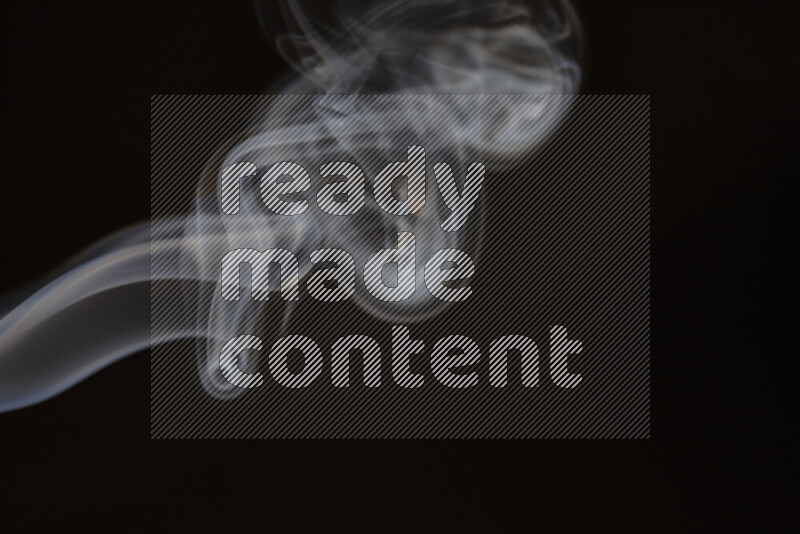Motion of wavy smoke isolated on dark background