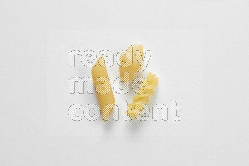 Different pasta types on white background