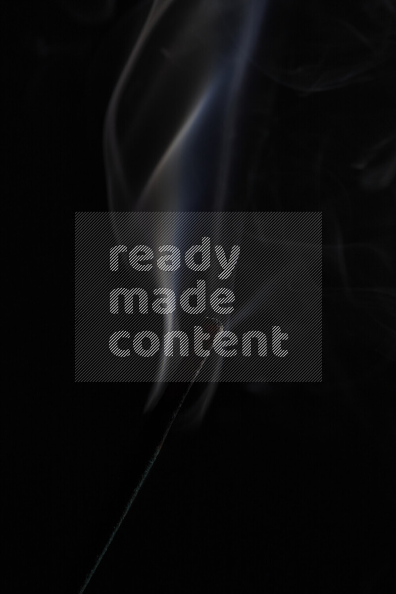 Motion of wavy smoke isolated on dark background