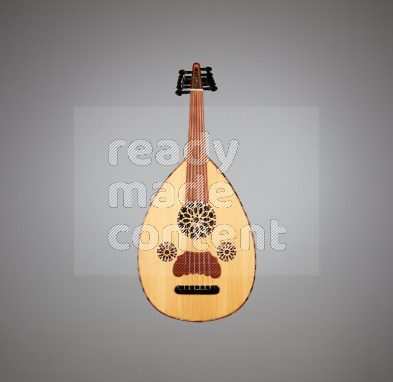 a wooden brown Oud on a gray background