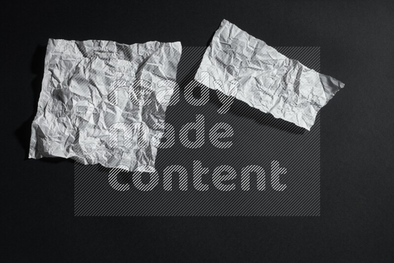 White paper sheet on black background