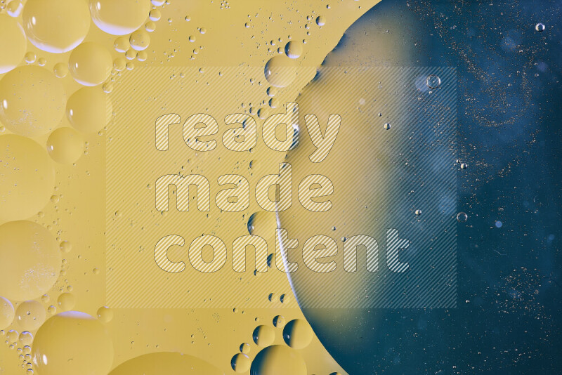 Close-ups of abstract oil bubbles on water surface in shades of blue and yellow