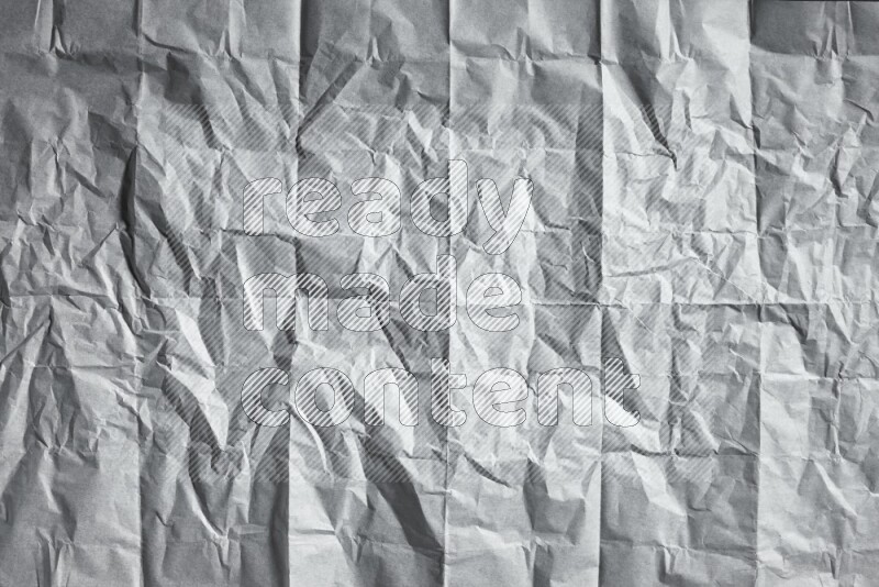 White paper sheet on black background
